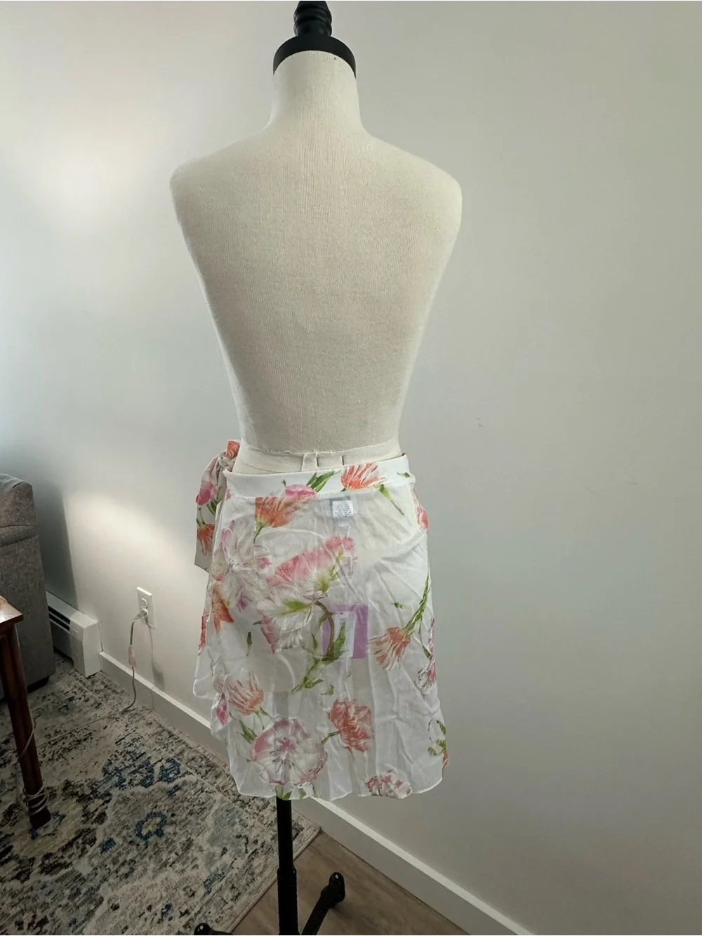 Leggiadro White Floral Tie-Wrap Mini Skirt with Pink & Green Accents
